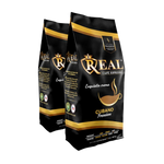 Load image into Gallery viewer, Two black and gold 2 lb bags of Café Real whole bean espresso coffee
