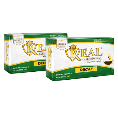 Two green and white Café Real Decaf ground espresso brick packs, 10 oz each